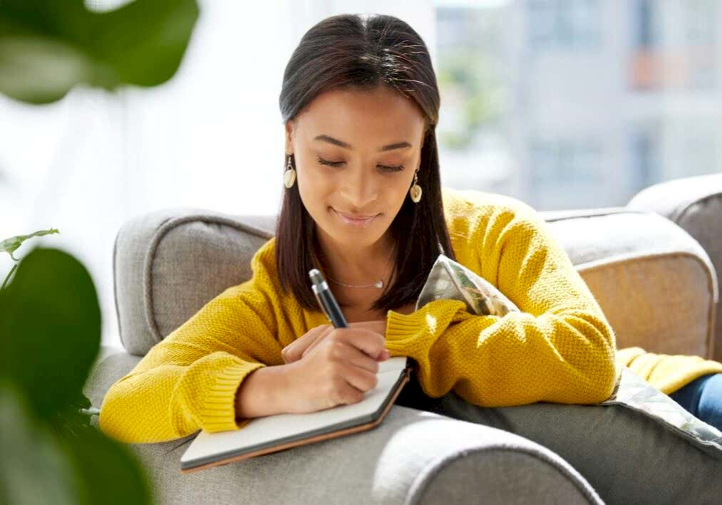 lady writing wedding vows for her special day